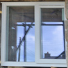 Close up of a window frame as it's being fitted
